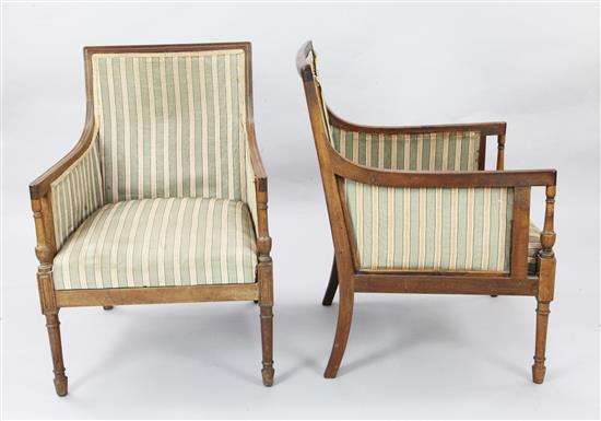 A pair of Regency style mahogany Bergere armchairs, W.2ft D.2ft 1in. H.2ft 10in.